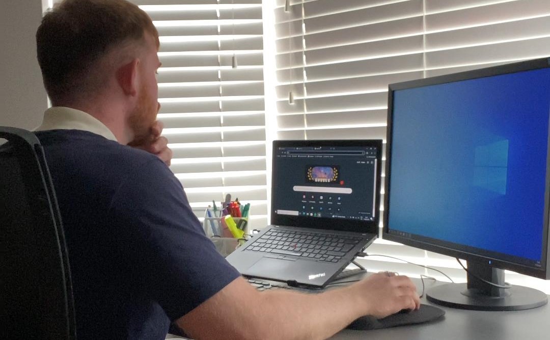 Ethan Greene working away at his computr set up.